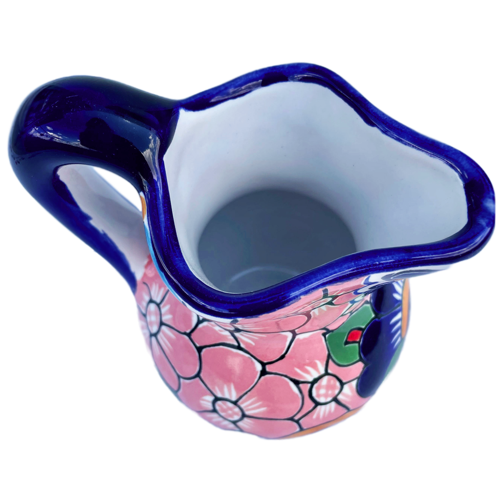 Pink flowered creamer